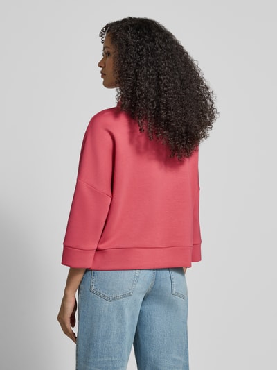 Vrouwenmodel draagt Boxy Fit Sweatjacke met Viskose-Anteil van Tom Tailor in effen kleur, scuba materiaal, 3/4-mouwen, rugaanzicht