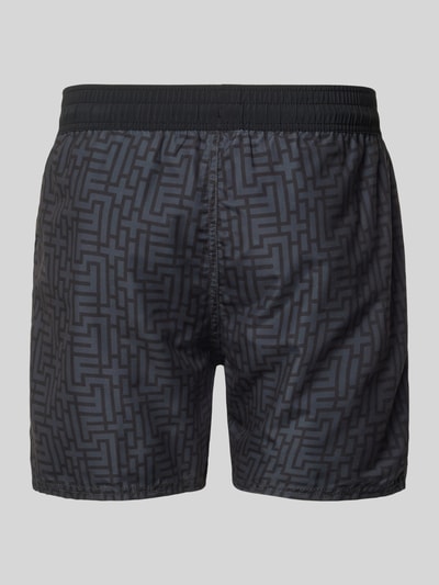 Produktfoto, Regular Fit Badeshorts mit Tunnelzug Modell 'Nelson' von FIRE + ICE für Herren mit geometrischem Allover-Print, elastischer Bund, Rückansicht, glatte Stofftextur, dunkle Grautöne.