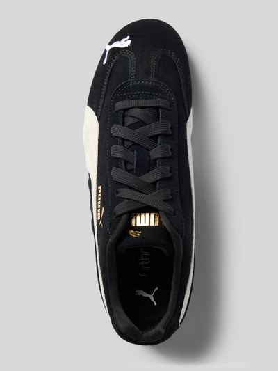 Produktfoto, Sneaker aus Leder-Mix Modell 'Speedcat' von PUMA in Schwarz mit abgerundeter Spitze, Logo-Stitching und Label-Details, Damen Sneaker, Schnürung, Absatzhöhe 1 cm, Schafthöhe 7 cm, Schaftweite 8 cm.