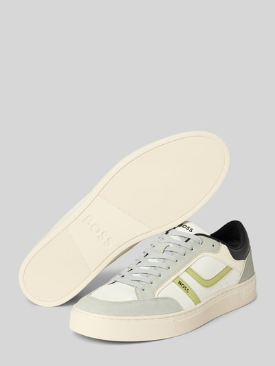 Produktfoto, Low Top Sneaker mit Label-Prägung Modell 'RHYS_TENN_PUMI' von BOSS Orange in unifarbener Lederoptik, runde Schuhspitze, strukturierte Sohle, Kunstleder