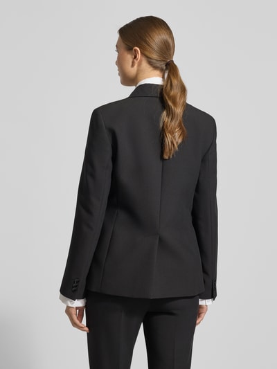 Frauenmodel trägt Slim Fit Blazer mit Viskose-Anteil von Weekend Max Mara, Optik: Unifarben, Reverskragen, 2-Knopf-Verschluss, Pattentaschen, Ganzkörperansicht Rückansicht.