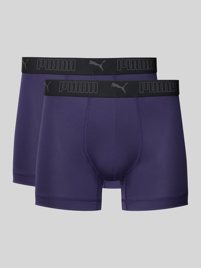 Produktfoto, Slim Fit Trunk mit Logo-Stitching von PUMA in Dunkellila, elastischer Bund, glatte Textur, figurbetonter Schnitt
