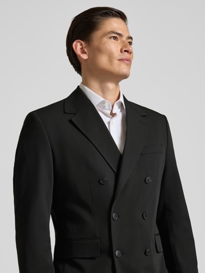 Männermodel trägt Regular Fit Anzugsakko mit Viskose-Anteil Modell 'LIAM' von SELECTED HOMME, unifarben, Nahaufnahme Oberkörper.