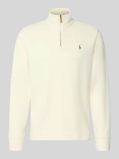 Produktfoto, cremeweißer Relaxed Fit Troyer aus reiner Baumwolle von Polo Ralph Lauren mit weicher Struktur und halblangem Zipper vor grauem Hintergrund