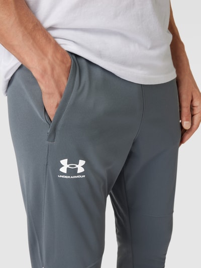 Under Armour Spodnie typu track pants z elastycznym pasem Grafitowy 3