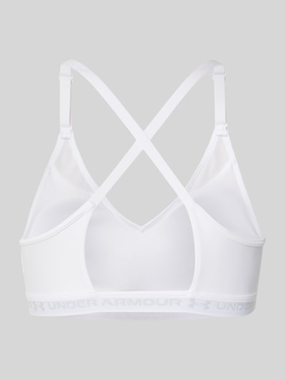 Produktfoto, weißer Sport-BH mit Label-Schriftzug Modell 'UA Crossback Low Bra' von Under Armour, Damen Sport-BH von Under Armour, Rückseite, glatte Textur