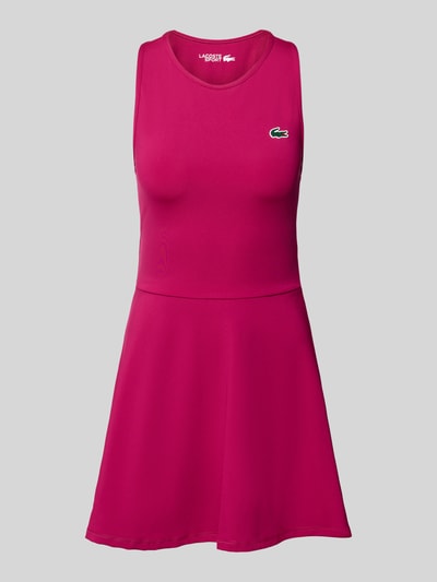 Produktfoto, Ausgestelltes Sport-Kleid mit Separate Innenhose von Lacoste in kräftigem Pink, glatte Textur, Damen Sport-Kleid von Lacoste Sport