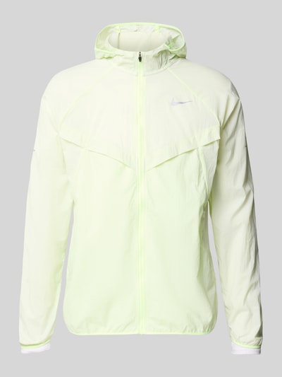 Produktfoto, Trainingsjacke mit Logo-Print und Kapuze von NIKE TRAINING in hellem Gelb, gerader Schnitt, Reißverschluss, strukturierte Oberfläche.