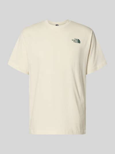 Produktfoto, Relaxed Fit T-Shirt mit Logo-Print von The North Face, bawełna, kolor kremowy, krój relaxed fit, logo z przodu, okrągły dekolt, długość tyłu w rozmiarze M: 70 cm