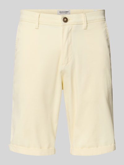 Produktfoto, Straight Fit Shorts mit Eingrifftaschen Modell 'Bowie' von Jack & Jones in hellem Gelb, Struktur glatter Baumwoll-Mix, klassische Frontansicht, sichtbarer Knopf- und Reißverschluss, Taschen vorn und hinten, Kontext Herren Shorts elastischer Baumwoll-Mix, Bundweite 44 cm, Innenbeinlänge 25 cm.