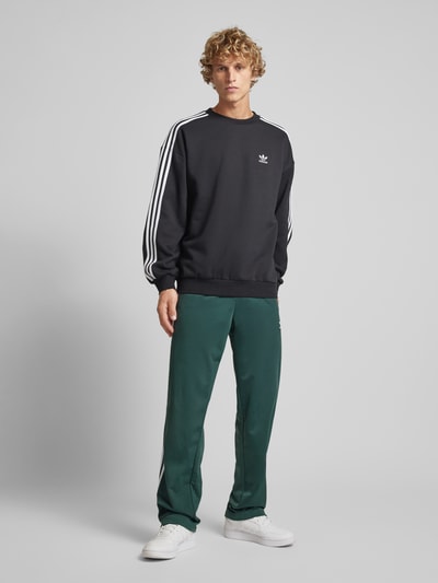 adidas Originals Sweatpants mit elastischem Bund Dunkelgruen 1