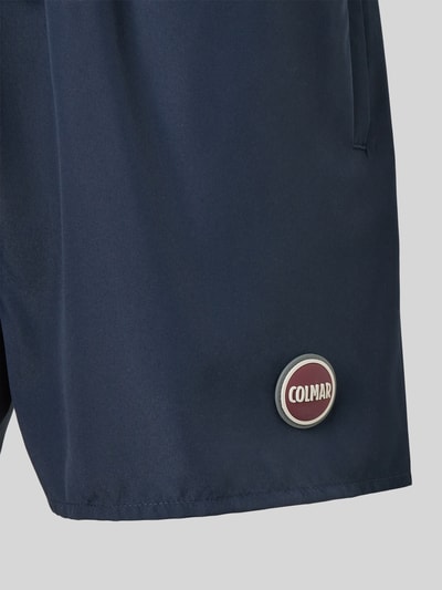 Produktfoto, dunkelblaue Badehose mit Elastikbund und Tunnelzug, Label-Detail, Modell 'Solid' von Colmar Originals, Gerade Passform