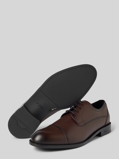 Produktfoto, brązowe buty sznurowane z naturalnej skóry o gładkiej i lekko ziarnistej fakturze, model 'Tayil_Derb' od BOSS, buty sznurowane męskie