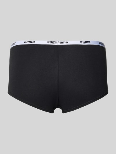 Frauenmodel trägt Pants mit elastischem Logo-Bund im 3er-Pack von PUMA, schwarzer Baumwoll-Elasthan-Mix, körpernaher Schnitt, Ganzkörperansicht Rückansicht.