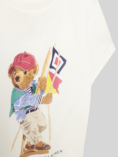 Mädchen trägt Regular Fit T-Shirt aus reiner Baumwolle von Polo Ralph Lauren Teens, unifarben, Motiv-Print, Nahaufnahme Oberkörper.