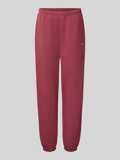 Nike Oversized Sweathose aus Baumwoll-Mix Dunkelrot 1