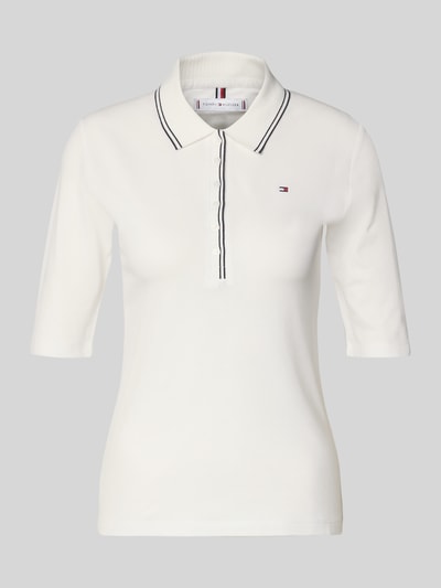 Produktfoto, Slim Fit Poloshirt aus Lyocell-Mix von Tommy Hilfiger, Optik: Unifarben, Logo-Stitching, Kontraststreifen, Piqué-Struktur, 1/2-Arm, Knopfleiste.