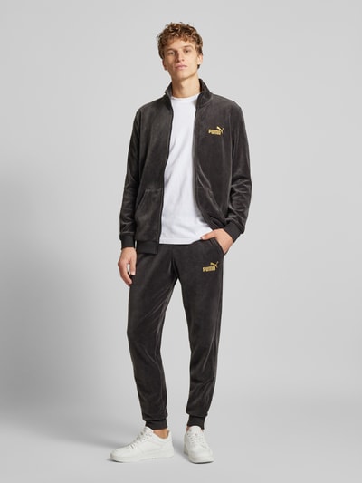 PUMA PERFORMANCE Relaxed Fit Sweatpants mit Label-Stitching Modell 'Velvettrack' Black 1