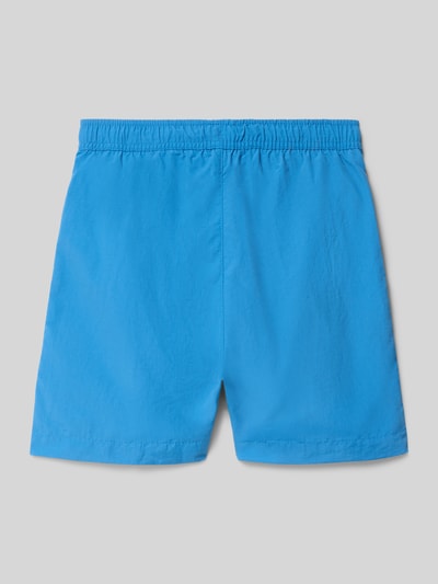 Productfoto, Badehose mit Eingrifftaschen und Logo-Print van CHAMPION voor kinderen, loose fit, elastische band met trekkoord, zij-steekzakken, logoprint, helderblauw met gladde textuur.