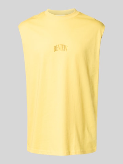 REVIEW Top z nadrukiem z logo Pastelowy żółty 2