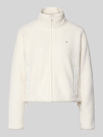Produktfoto, Regular Fit Teddy-Jacke mit verdecktem Reißverschluss von Tommy Jeans, efekt: jednolity kolor, imitacja futerka, wyhaftowane logo, krój regular fit, stójka, zapięcie na zamek błyskawiczny, kieszenie zapinane na zamek błyskawiczny, wykończenie materiału: futerko