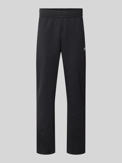 Produktfoto, Tapered Sweatpants mit Baumwoll-Anteil von Lacoste Sport, czarne, jednolite, materiał scuba, logo-patch, elastyczny pas, krój tapered