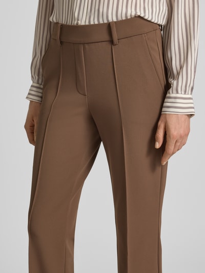 Vrouwenmodel draagt Regular fit broek met elastische band model 'FRANCOISE' van CAMBIO in Dames wijdte, close-up taille en bovenbenen.