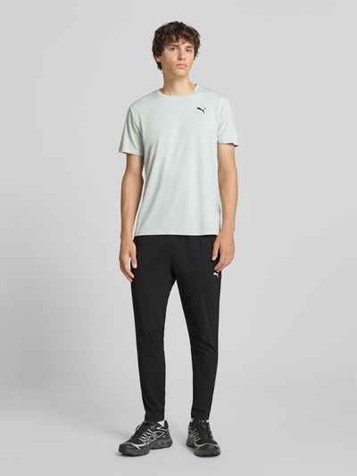 PUMA Performance Tapered Fit Trainingshose mit elastischem Bund Modell 'TAD ESSENTIALS' Black 1