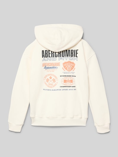 Produktfoto, Hoodie mit Label-Stitching von Abercrombie&Fitch in Creme, Baumwollmischung, lockerer Schnitt, Kapuze, bunte Logoprints auf Rückseite, gerippte Abschlüsse, Känguru-Tasche