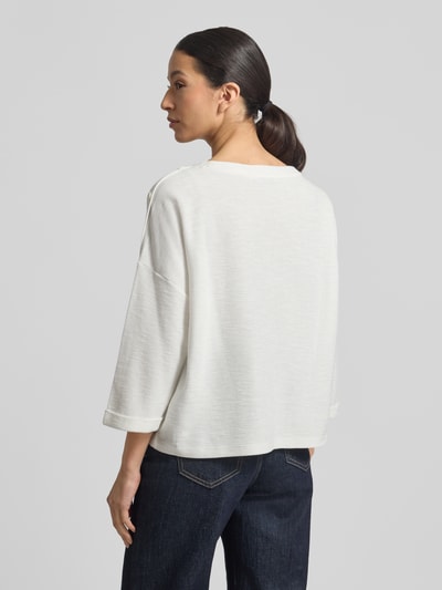 Vrouwenmodel draagt Loose Fit 3/4-shirt uit katoenmix met modal van Tom Tailor, look: effen, schouderknopen, boothals, piqué, katoenmix met modal, 3/4-mouwen met vaste omslag, pasvorm: loose fit, geheel van achteren