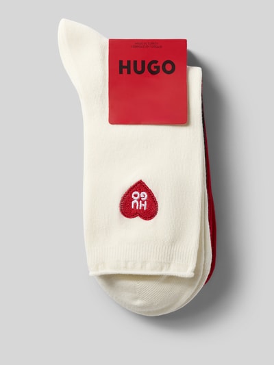 Produktfoto, Socken aus Baumwoll-Mix im 3er-Pack von HUGO, Optik: Unifarben, Label-Stitching-Applikation, Bundabschluss: Rollsaum, Multipack:3er-Pack, Material: Baumwoll-Mix, rote und weiße Farben, weiche Textur