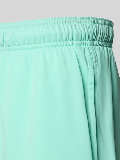 Produktfoto, Badehose mit Seitentaschen und Klettverschlusstasche hinten von PUMA in Mintgrün, glatte Oberfläche, elastischer Bund, Regular-Fit