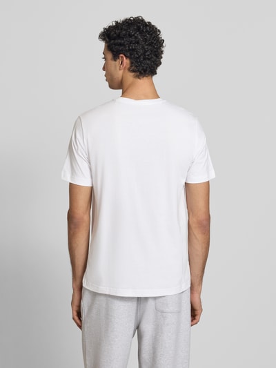 Männermodel trägt T-shirt mit ronde hals, regular fit, puur katoen, labeldetail, set van 2, ruglengte maat M 69 cm, T-Shirt met ronde hals in set van 2 van CHAMPION, Ganzkörperansicht Rückansicht.