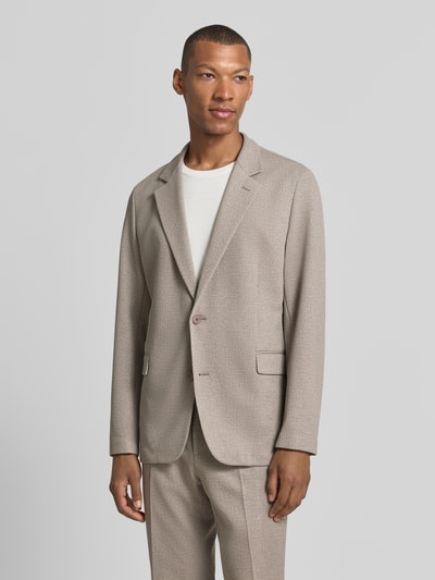 Männermodel trägt lichtbeige Super Slim Fit Sakko mit viscose, model 'Anton263X-H' van HUGO voor Heren, ganzlichaamsvooraanzicht.