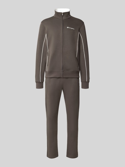 Produktfoto, Trainingsanzug aus Baumwoll-Mix von Champion in Dunkelgrau mit weißen Kontrastnähten, Stehkragen, Label-Prints, elastischer Bund
