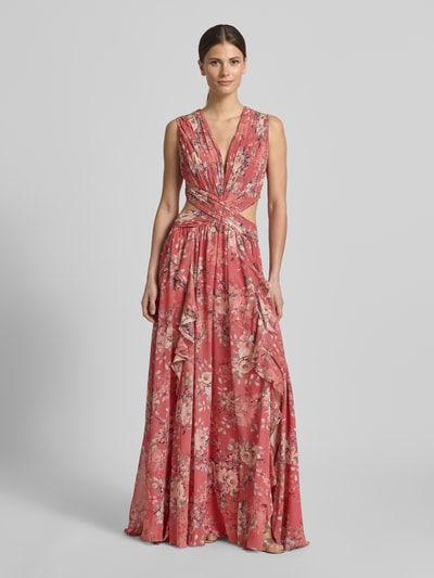 Kobieta modelka nosi Regular Fit Maxikleid mit floralem Allover-Print od ADLYSH, kwiatowy nadruk na całej powierzchni, krój regular fit, plisy, dekolt w serek, bez rękawów, obszycie falbanami, wycięcia, wiązanie, długość tyłu w rozmiarze S: 52 cm, szerokość w rozmiarze S: 32 cm, widok całej sylwetki z przodu