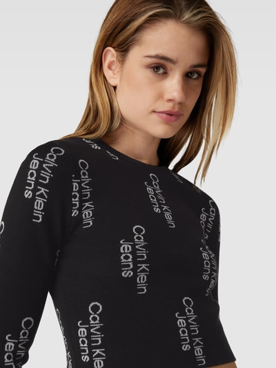 Calvin Klein Jeans Cropped Stickpullover mit Allover-Label-Muster Black 3