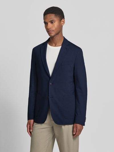 Männermodel trägt Slim Fit Anzugsakko mit Reverskragen Modell 'P-HANRY-J-WG-233' von BOSS, Optik: Unifarben, Materialverarbeitung: Four-Way-Stretch, Ganzkörperansicht von vorne.