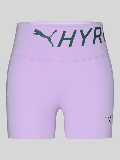 Produktfoto, Skinny Fit Sportshorts mit Label-Print Modell 'PUMA x HYROX PWRMODE 4' von PUMA in Helllila, glatte Oberfläche, Damen Sportshorts von PUMA Performance