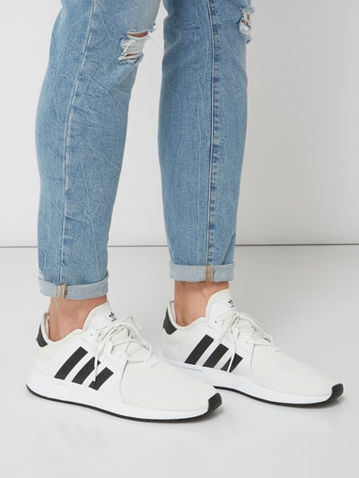 Adidas x_plr store with jeans