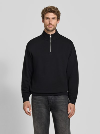 Männermodel trägt Regular fit schipperstrui aus katoenmix model 'Dalizip' von HUGO, Heren Troyer, zwart, Ganzkörperansicht von vorne