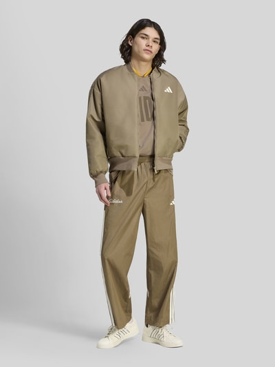 adidas Sportswear Loose Fit Blouson mit Logo-Print Modell 'STADIUM' Beige 1