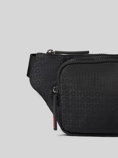 Produktfoto, Bauchtasche mit verstellbarem Schulterriemen Modell 'Ethon_JQ' von HUGO, schwarzer Stoff mit Logomuster, Herren Rucksack von HUGO