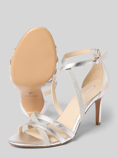 Productfoto, Sandalen in schimmernder Optik van Tamaris, zilverkleurig, afgeronde neus, stilettohak, gesp als sluiting, damesmodel