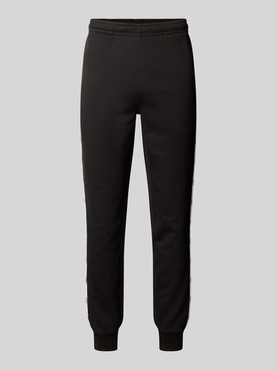 Lacoste Loose fit sweatpants van puur katoen, model 'TAPE' Zwart - 2