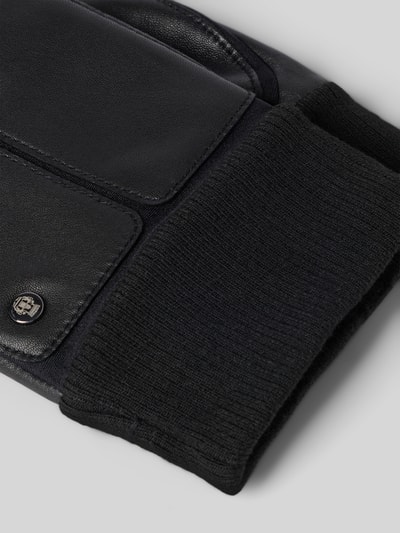 Produktfoto, Lederhandschuhe aus echtem Leder Modell 'Kopenhagen' von Roeckl, schwarzes Leder mit Ziernähten, metallic Label-Detail, elastische Rippbündchen, Fingerhandschuhe, detailreiche Struktur