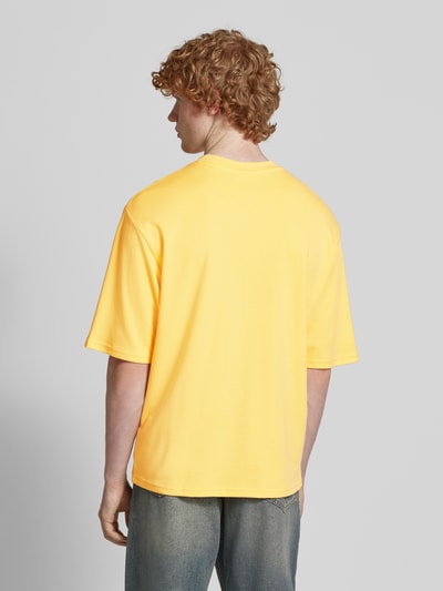 REVIEW Oversized T-Shirt mit Label-Print Pastellgelb 5