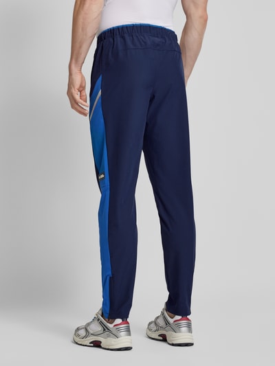 Under Armour Slim Fit Sweatpants mit Logo-Print Modell 'Vanish Utility' Dunkelblau 5