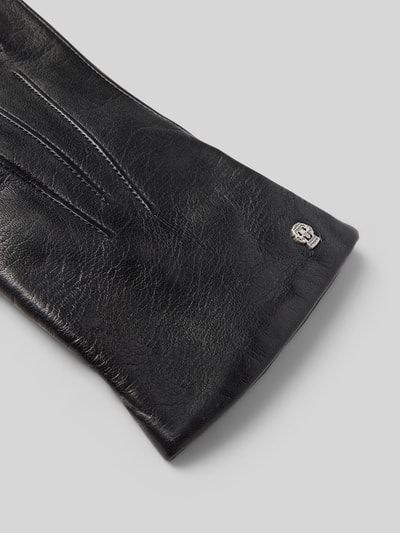 Produktfoto, Lederhandschuhe aus echtem Leder Modell 'Dover' von Roeckl in Schwarz, feines Haarschaf Nappaleder, Kaschmir-Mix Futter, klassischer Umbugsaum, Label-Detail in metallic, drei Aufnähte, glatte Textur