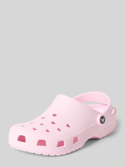 Productfoto, Clogs met labeldetail van Crocs in lichtroze, comfortmodel met afgeronde punt, verstelbare riempjes, hakhoogte maat 39/40: 4 cm